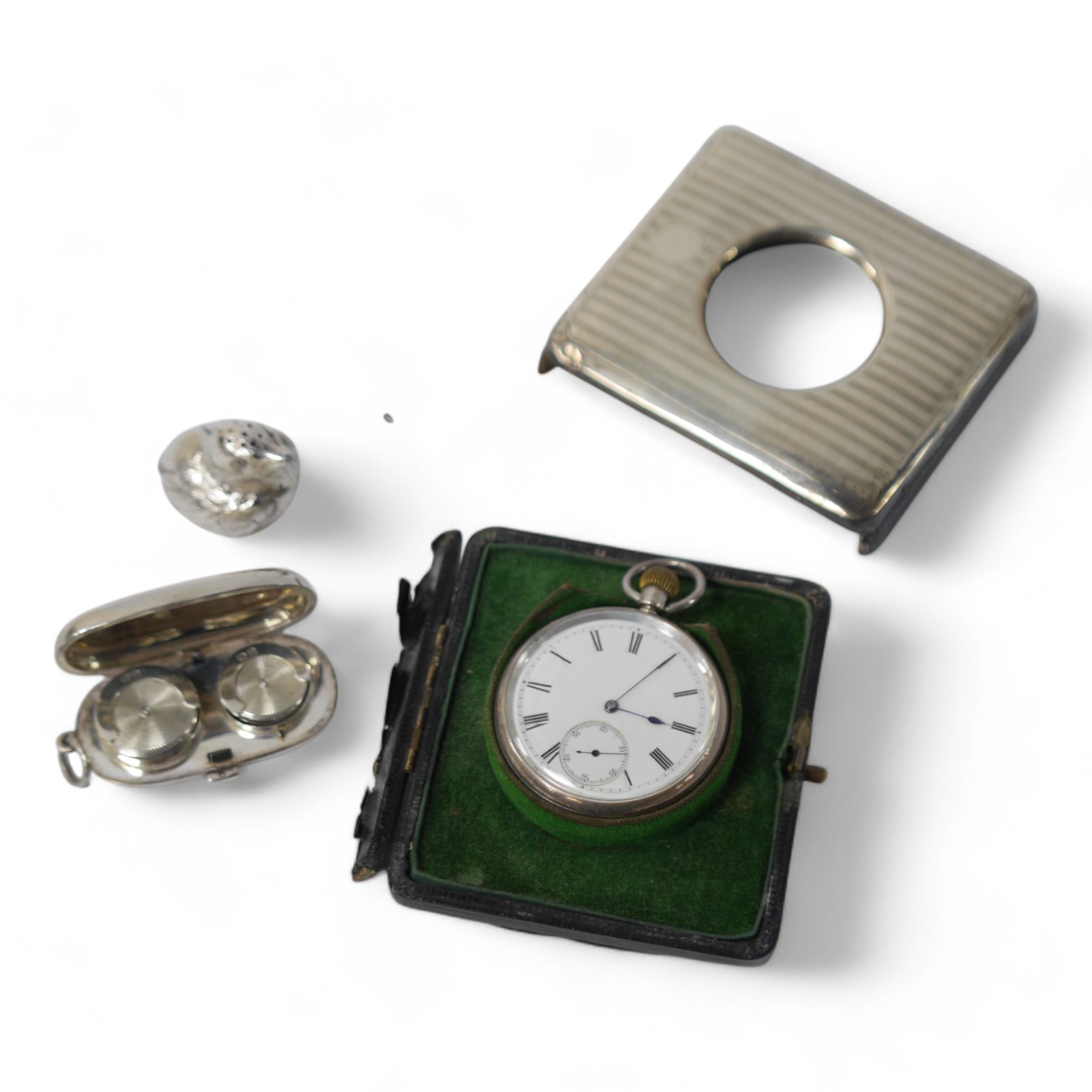 A George V silver sovereign/half sovereign case, by George Unite & Sons, Birmingham, 1911, 59mm, together with an Edwardian silver miniature free-standing model of a bird spice box with detachable head, import marks for